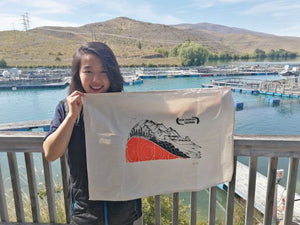 Artist Trisha Gan with Teatowel High Country Salmon